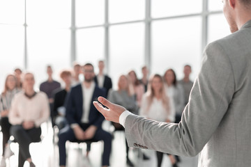 image of a speaker giving a lecture at a business seminar - obrazy, fototapety, plakaty