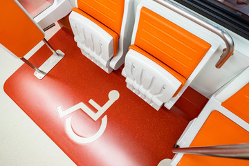 Disabled place in the subway. The concept is life with disabilities. A place for people with...