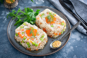 Homemade jelly with chicken, pork peas with slices of carrots, horizontal