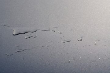 water drops on metal floor background