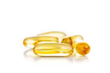 Close-up on fish oil capsule, contains omega-3 polyunsaturated acid EPA and DHA that enhances heart and health.