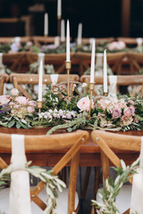 Boho wedding chair with eco decor for guests.