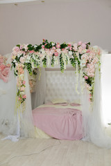 bedroom in pink color with lots of flowers