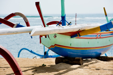 Traditional boats on Sanur Beach, Bali, Indonesia.