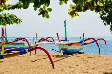Traditional boats on Sanur Beach, Bali, Indonesia.