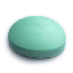 green soap with the taste of cucumber on a white background