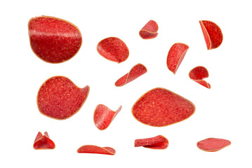 Falling salami isolated on white background.