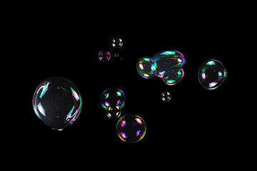 Soap bubbles isolated on a black background.