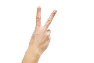 Top view: female hand with clean healthy skin on a white isolated background showing gestures