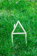 Model house made on green grass