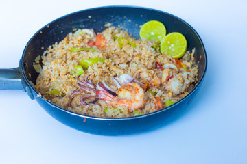 Asian fried rice with tiger prawn shrimp and seafood.