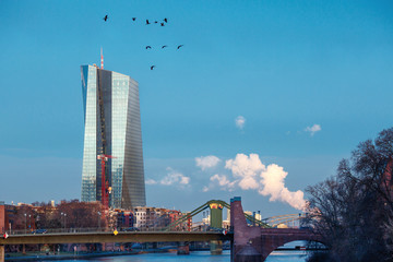 New European Central Bank (ECB) building and river Main bridges in Frankfurt Main, Germany