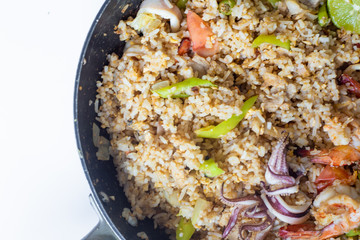 Asian fried rice with tiger prawn shrimp and seafood.