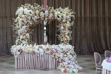 Wedding arch decorations with white roses