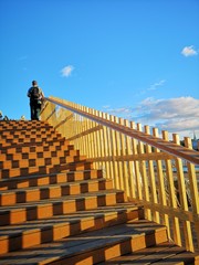 checked pattern on the stairs casted by sunset