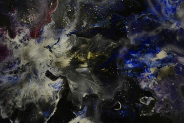 the spreading paint in the technique of reinart formed a cosmic veil