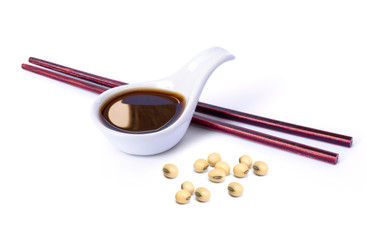  soy sauce with soy beans isolated on white background. 