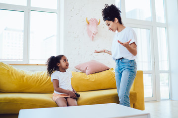 African American parent talking with child