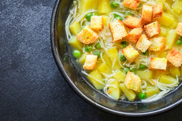 vegetable soup
green peas and small thin pasta vermicelli
Menu concept. food background. top view copy space for text
keto or paleo diet