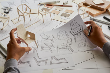 Designer sketching drawing design development product plan draft chair armchair Wingback Interior...