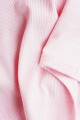 Bright pink fabric texture close up view