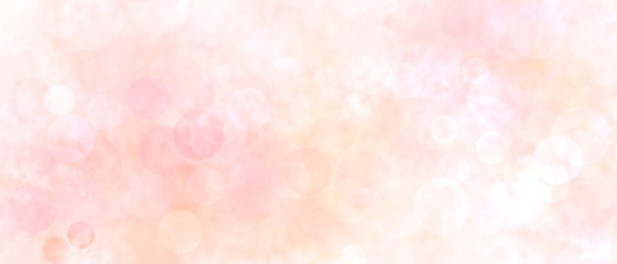 Romantic abstract bokeh background. Blurry spots of pink and orange colors.
