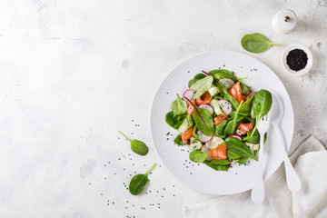 Salmon Salad with Vitamins in vegetables, herbs radish,and spinach