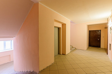 Russia, Moscow- December 05, 2019: interior room apartment public place, house entrance. doors, walls, corridors staircase