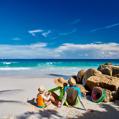 Family with three year old boy on beach