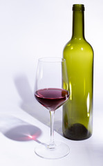 Bottle and glass of red wine