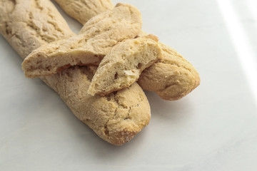 Homemade italian bread on light background