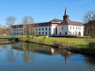 Fototapeta na wymiar Beautiful cityscape of Grevenbroich Wevelinghoven in Germany with Erft river