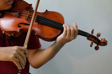 Practicing viola for competition and performances and concerts for the enjoyment of listeners.