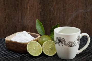 Baking soda - sodium bicarbonate, hot water and lemon. 