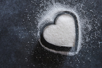 White Granulated Sugar in a Heart Shape