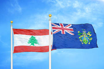 Lebanon and Pitcairn Islands two flags on flagpoles and blue cloudy sky