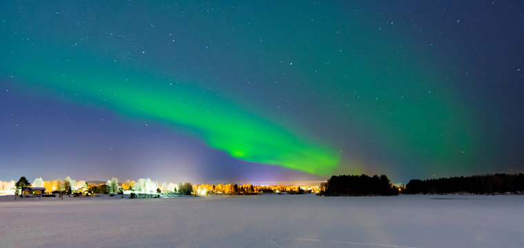 Tourists admiring the Northen Lights in Lapland, Finland