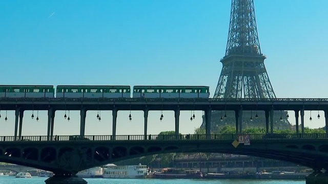 Metro train over Bir-Hakeim bridge and the Eiffel Tower - Paris - France