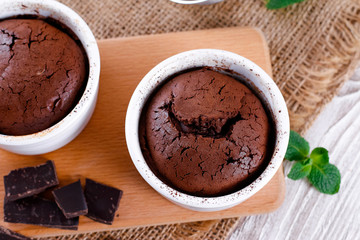 Chocolate cupcakes or muffins with cherries