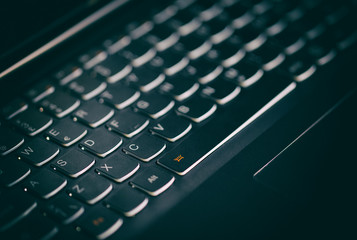 
Computer keyboard in dark vignette