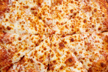 A top down view of a standard cheese pizza, as a background.