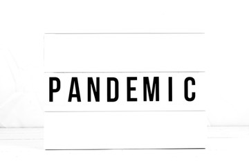 Pandemic flat lay on a white background. Public Health Awareness on a Vintage Retro quote board