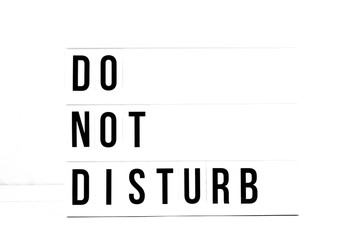 Do Not Disturb flat lay on a white background. Vintage Retro quote board