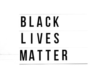 Black Lives Matter flat lay on a white background. Freedom of Speech Vintage Retro quote board