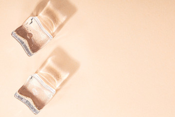 Colored banner with fresh ice cubes and reflections