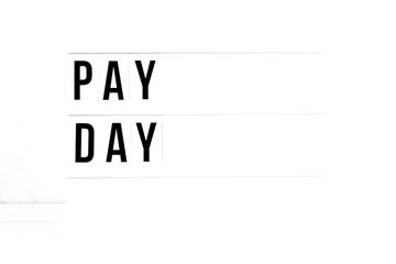 Pay Day flat lay on a white background. Business Vintage Retro quote board