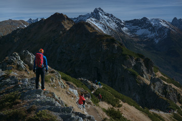 Fototapeta na wymiar Tourist hiking in Tatra Mountains