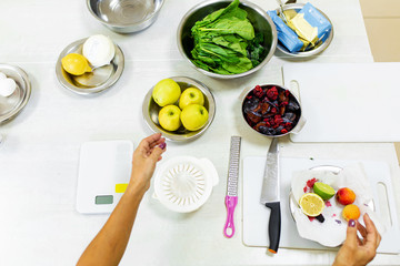 Cooking healthy and tasty fresh. Extracting fruit juice from a juicer