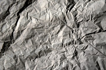 crumpled paper texture. gray background, copy space.