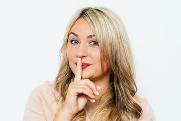Naklejka premium woman put finger on her lips